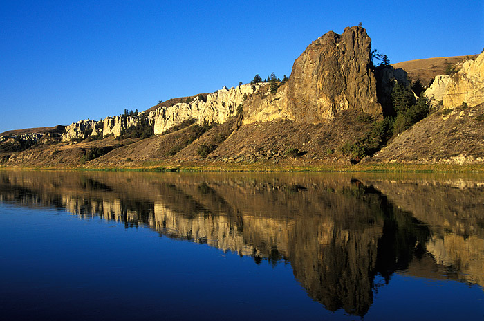A large block of lava sits amid white sandstone cliffs of the Missouri River in central Montana. &nbsp;The Lewis and Clark expedition...